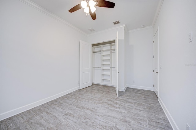 unfurnished bedroom featuring ceiling fan, a closet, and ornamental molding