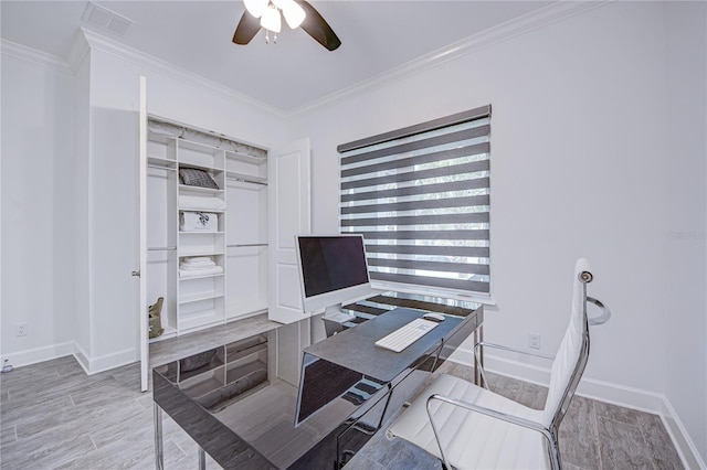 home office with ceiling fan and crown molding