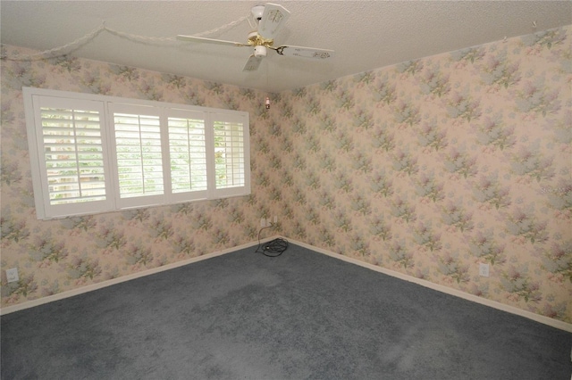 unfurnished room featuring a textured ceiling, carpet flooring, and ceiling fan