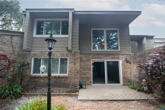 rear view of property with a patio