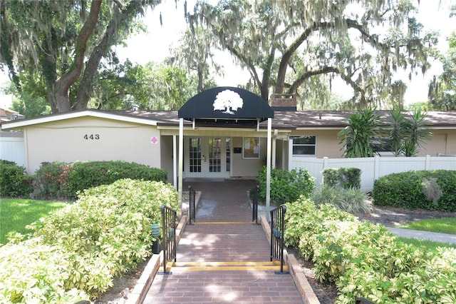 view of front of house with french doors