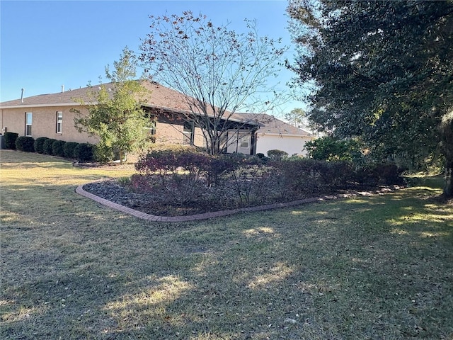 view of property exterior featuring a yard