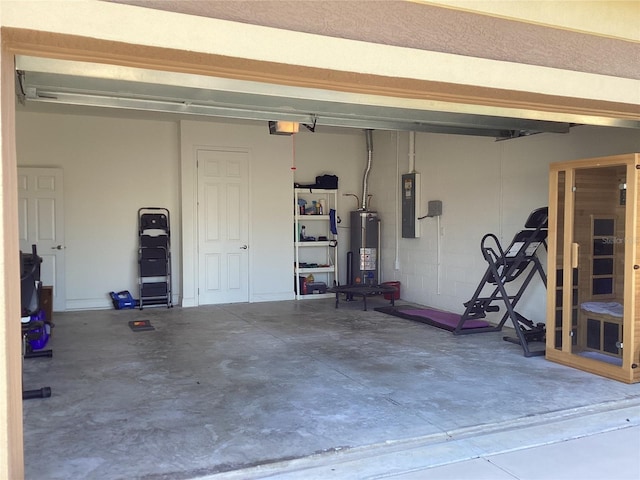 garage with electric panel, gas water heater, and a garage door opener