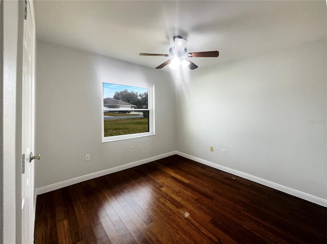 empty room featuring dark hardwood / wood-style floors