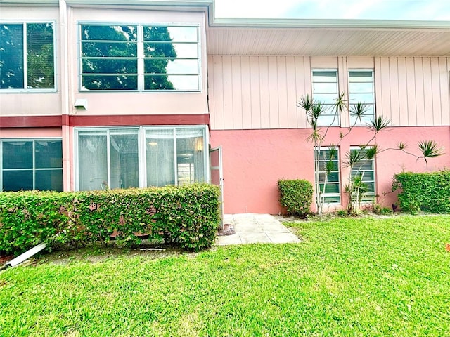 view of property exterior featuring a yard