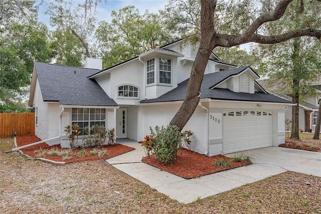 view of front of property featuring a garage