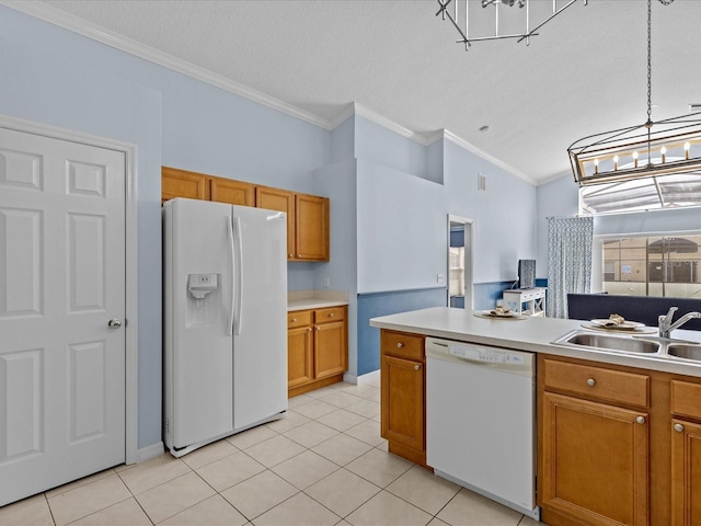 kitchen with hanging light fixtures, a notable chandelier, white appliances, and ornamental molding