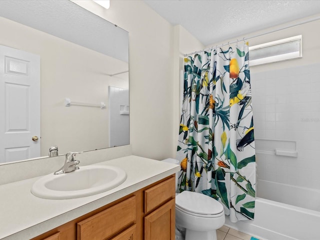 full bathroom with toilet, vanity, tile patterned floors, shower / bath combo, and a textured ceiling