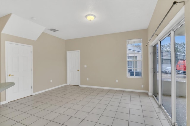 view of tiled spare room