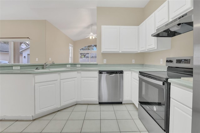 kitchen featuring sink, light tile patterned flooring, white cabinetry, and appliances with stainless steel finishes