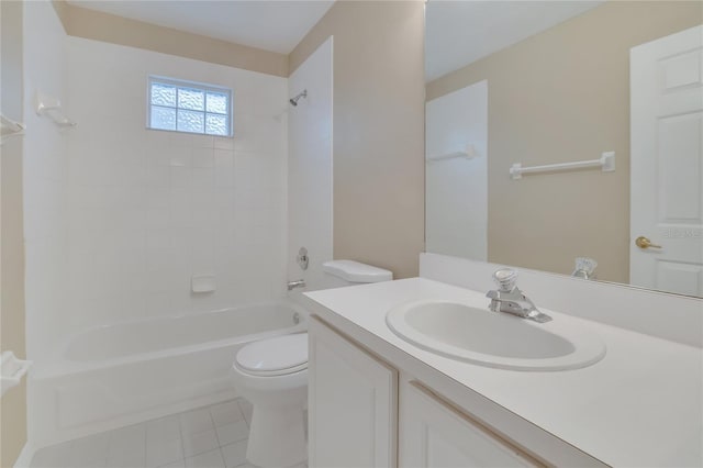 full bathroom featuring vanity, toilet, tile patterned floors, and tiled shower / bath combo