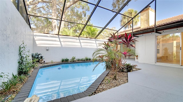 view of pool featuring a patio