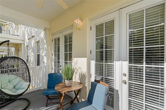 exterior space featuring ceiling fan