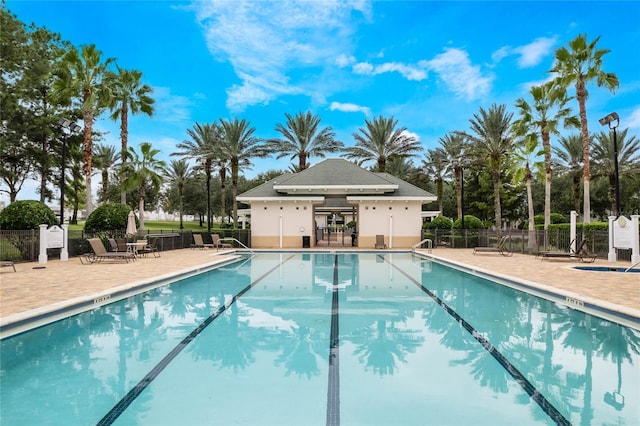 view of swimming pool with a patio