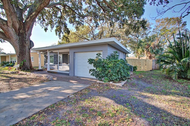 ranch-style house featuring a garage