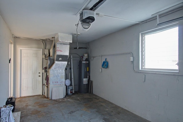 interior space featuring a garage door opener and electric water heater