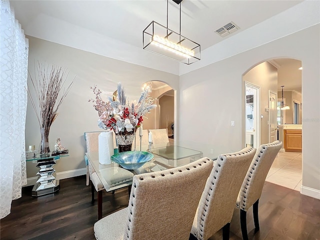 dining area featuring hardwood / wood-style flooring