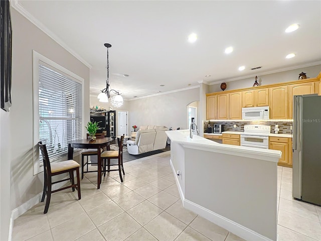 kitchen with tasteful backsplash, white appliances, light brown cabinetry, and light tile patterned floors