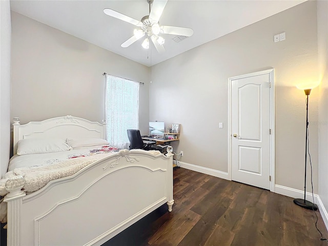 bedroom featuring dark hardwood / wood-style floors and ceiling fan