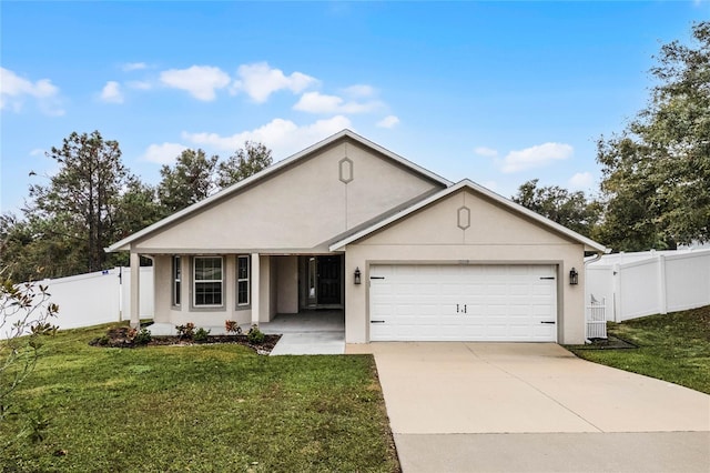 single story home featuring a garage and a front lawn