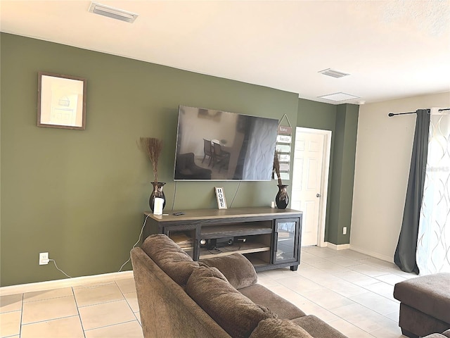 living room with light tile patterned floors