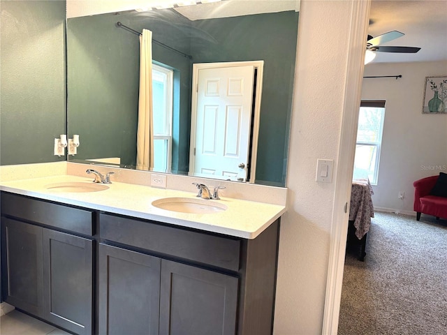 bathroom featuring vanity and ceiling fan