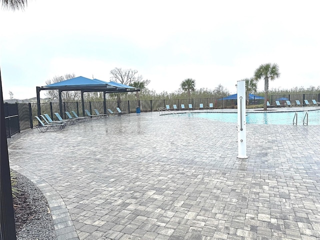 view of swimming pool featuring a gazebo