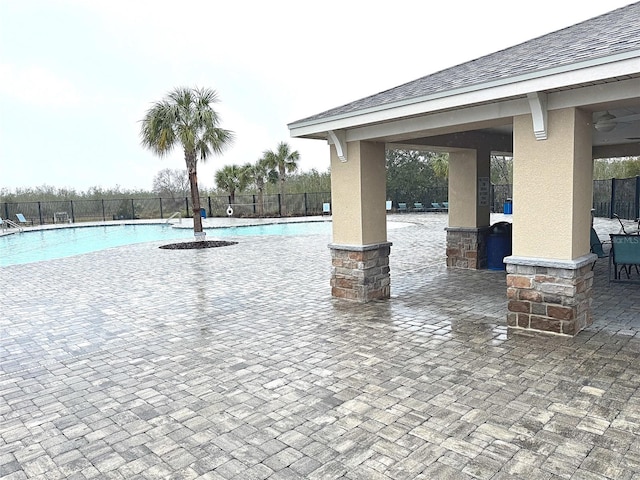 view of pool with a gazebo and a patio