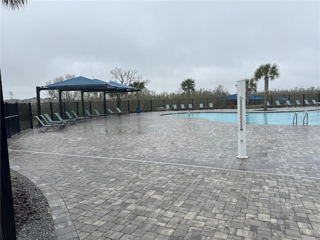 view of swimming pool with a gazebo