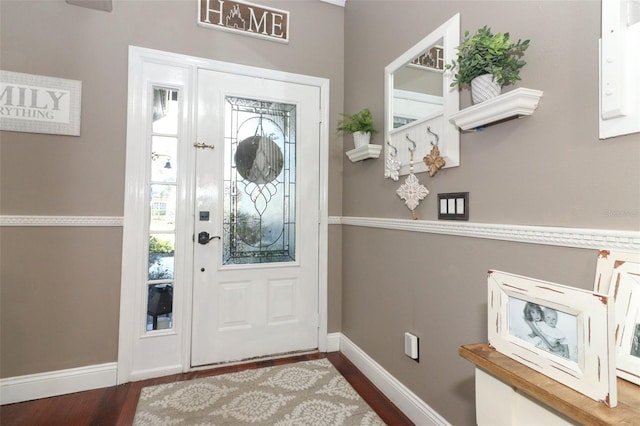 entryway with hardwood / wood-style floors