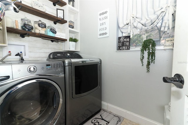 washroom featuring washer and dryer