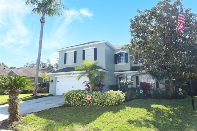 front facade with a garage and a front yard