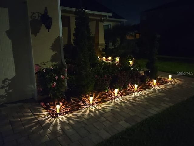 view of patio at night