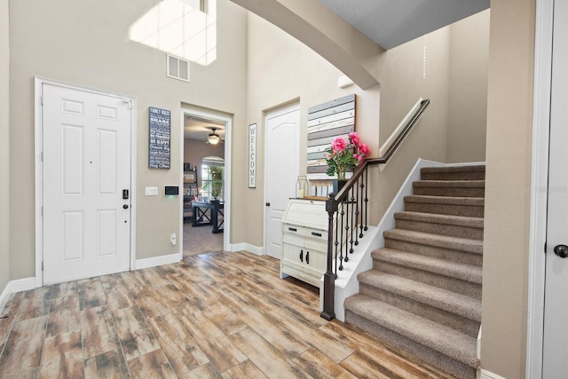 foyer with light hardwood / wood-style floors