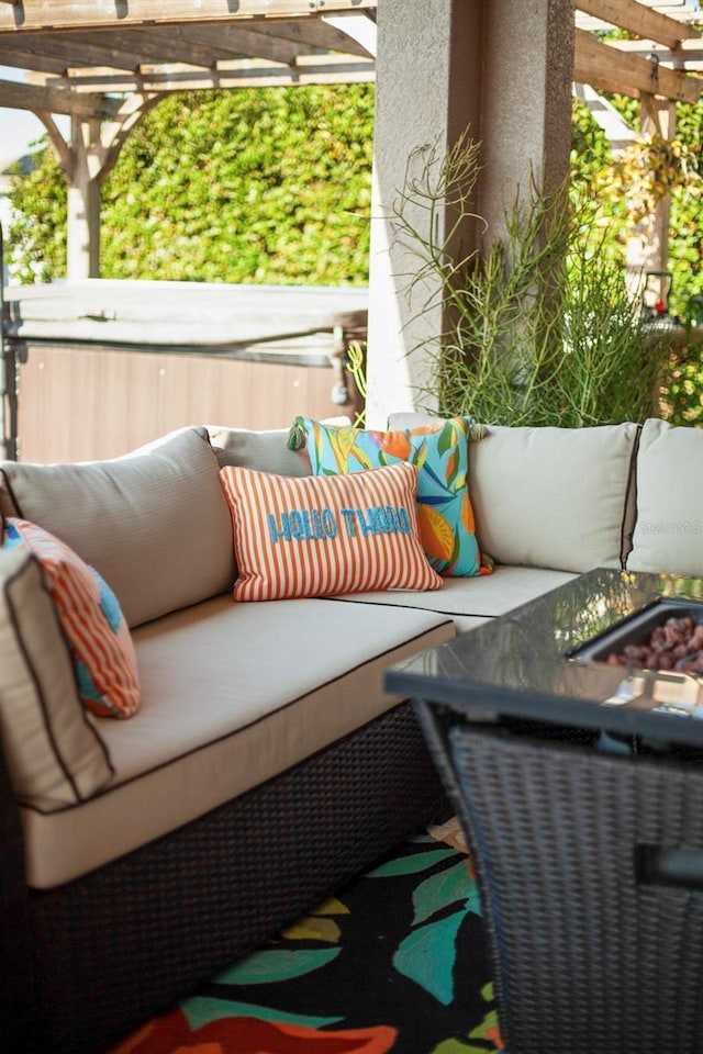 balcony featuring outdoor lounge area and a pergola