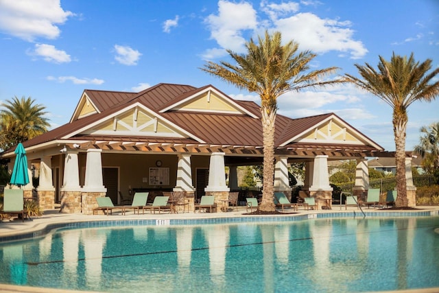 view of swimming pool featuring a patio area