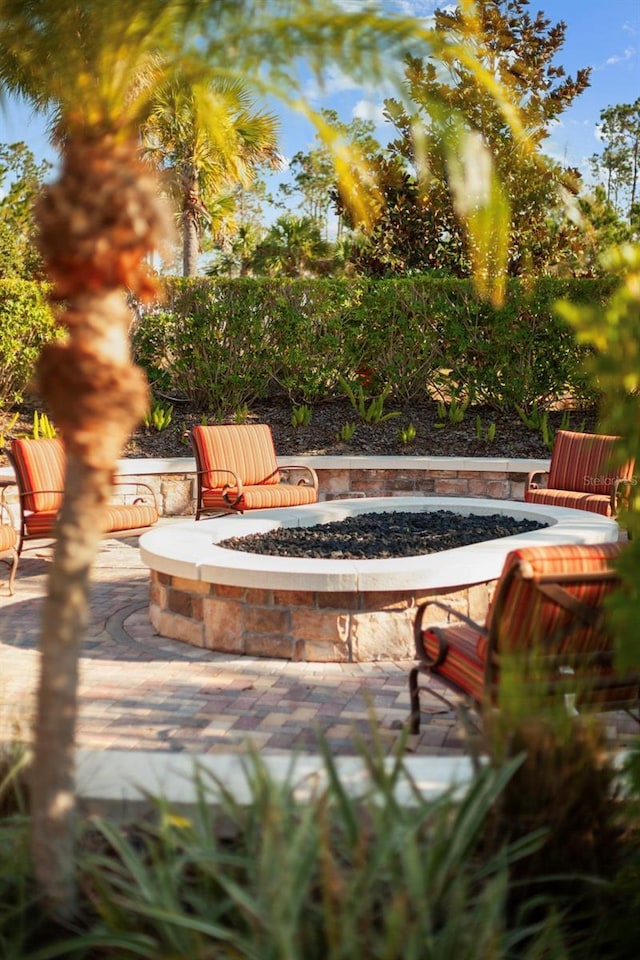 exterior space featuring an outdoor fire pit