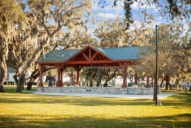 view of community with a gazebo and a yard