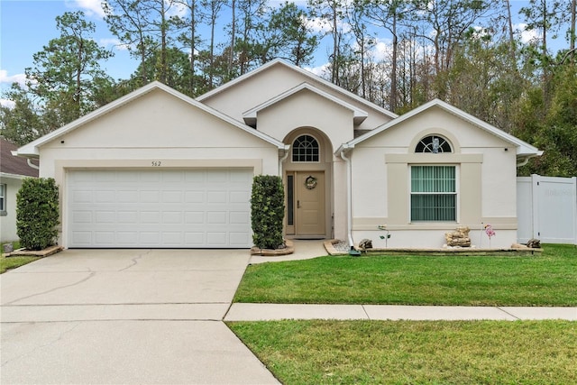 ranch-style home with a garage and a front yard