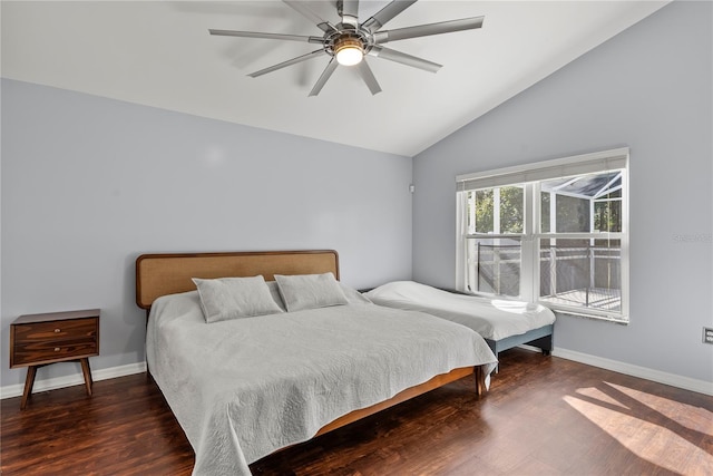 bedroom with ceiling fan, dark hardwood / wood-style floors, and lofted ceiling