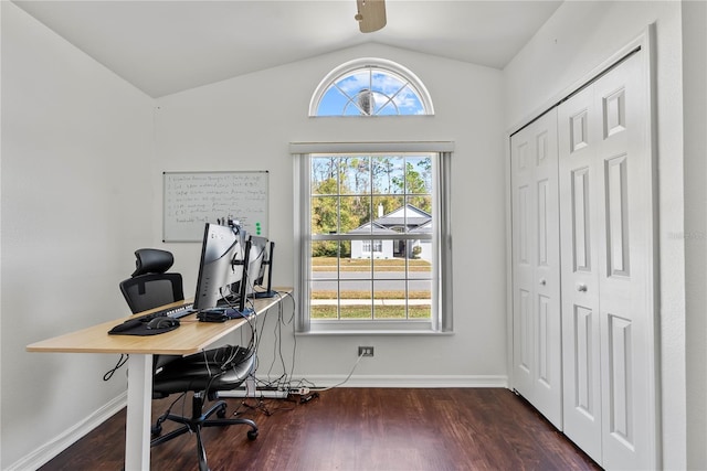 home office with dark wood-type flooring, vaulted ceiling, and plenty of natural light