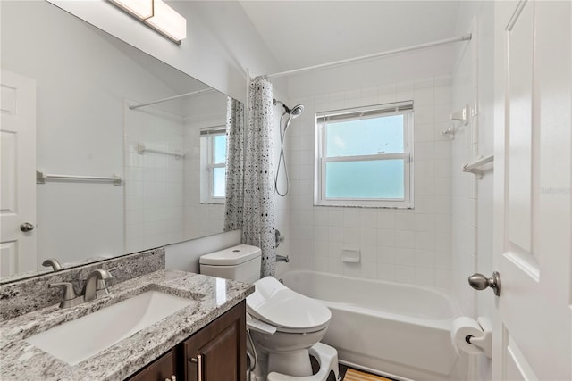 full bathroom with toilet, vanity, and shower / bathtub combination with curtain