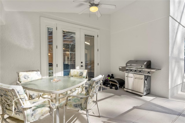 view of patio with ceiling fan and grilling area