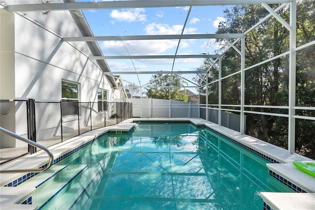 view of pool with a lanai