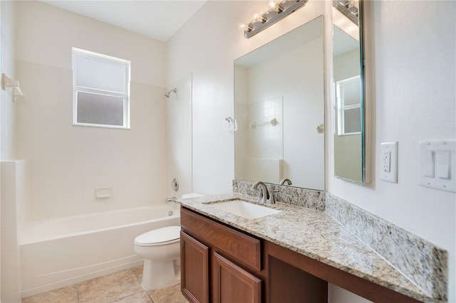 full bathroom featuring toilet, tile patterned flooring, tiled shower / bath, and vanity