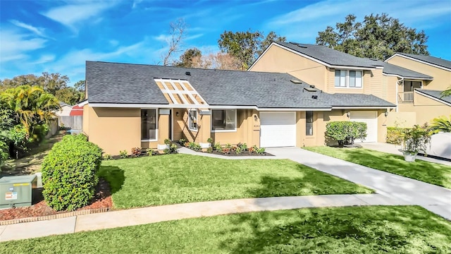 view of front of home with a front lawn