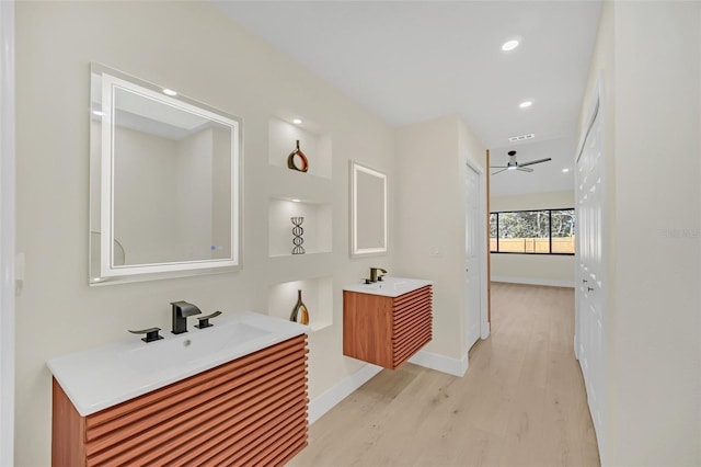 bathroom with vanity and hardwood / wood-style floors