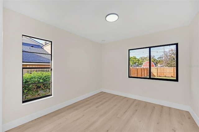 empty room featuring light hardwood / wood-style floors