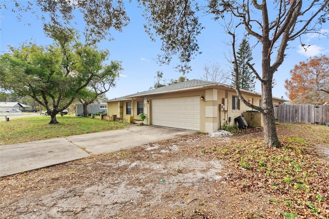 single story home featuring a garage