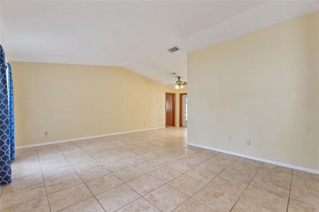 unfurnished room with ceiling fan, light tile patterned floors, and lofted ceiling